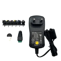 Universal Power Adapter SMPS 9/12/13.5/15/18/20/24V 1A 12W 7-plugs